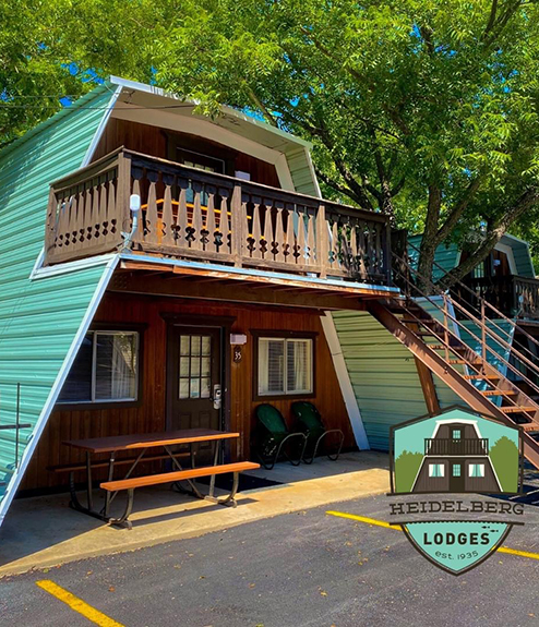 Heidelberg Lodges A-Frame Cottages located on the banks of the Comal River.